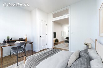 315 E 5th St, Unit 1107 in New York, NY - Building Photo - Building Photo