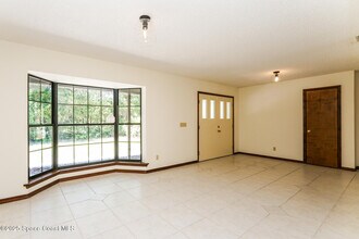 7001 Windover Way in Titusville, FL - Building Photo - Building Photo