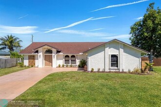 2451 SE Shell Ave in Port St. Lucie, FL - Building Photo - Building Photo