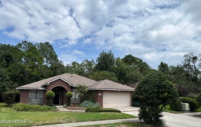 property at 8699 Canopy Oaks Dr