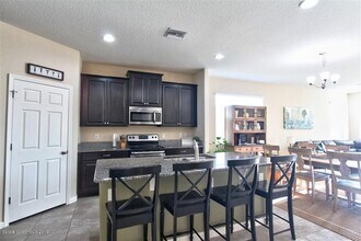 953 Musgrass Cir in West Melbourne, FL - Building Photo - Building Photo