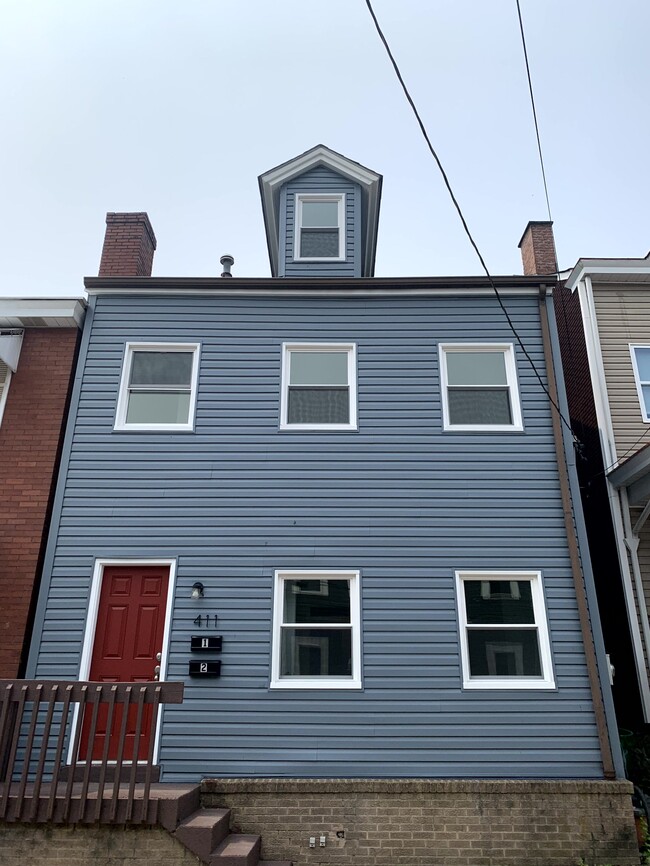 411 Sample St, Unit 1