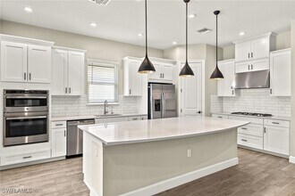 15254 Arpino Ct in Naples, FL - Building Photo - Building Photo