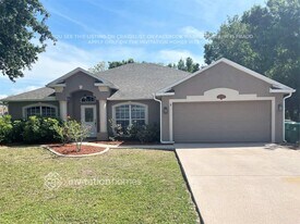 23283 Mulligan Ave in Port Charlotte, FL - Building Photo