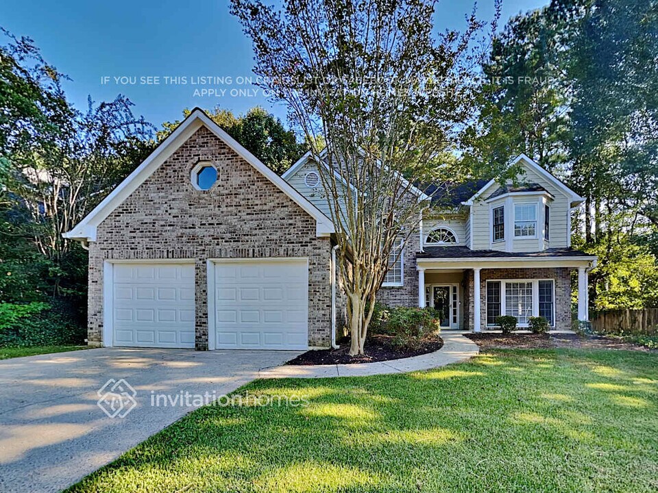 7102 Big Woods Dr in Woodstock, GA - Building Photo