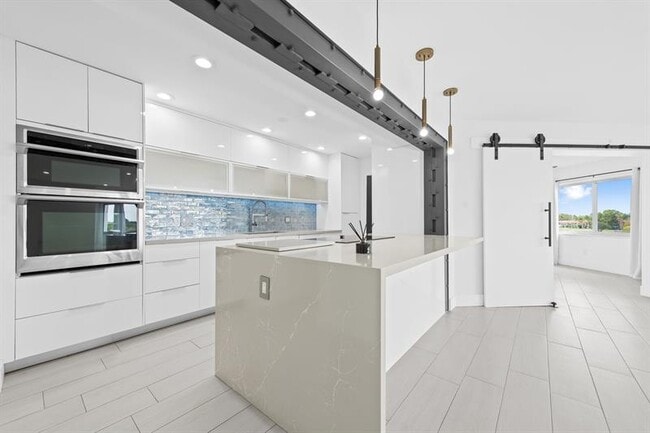 property at 877 NE 195th St