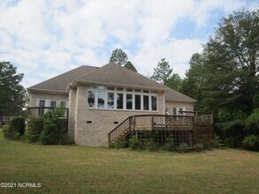 8 Country Club Blvd, Unit 504 in Whispering Pines, NC - Building Photo - Building Photo