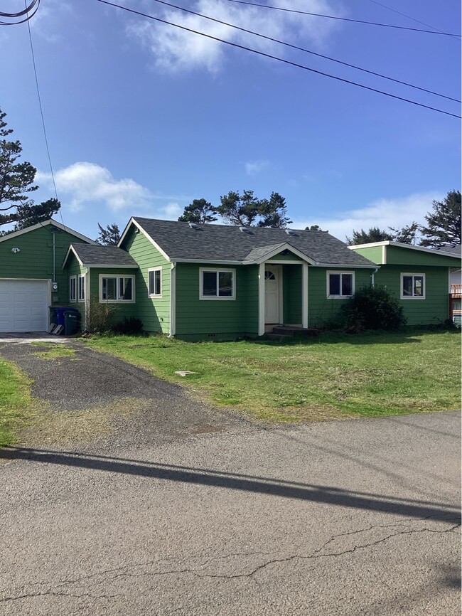 property at 5707 NW Rhododendron St