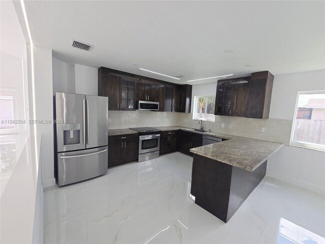 property at 4490 SW 19th St