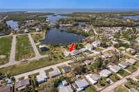 6647 Manor Beach Rd, Unit 1040FlatsAveApt407 in New Port Richey, FL - Building Photo - Building Photo