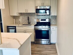 4201 CATHEDRAL NW, Unit 1012W in Washington, DC - Building Photo - Building Photo