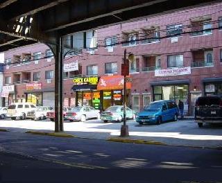 111-18 Roosevelt Ave in Corona, NY - Building Photo