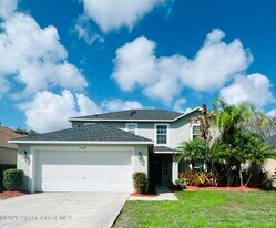 1718 Sawgrass Dr SW in Palm Bay, FL - Building Photo