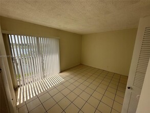 8720 N Sherman Cir, Unit 306 in Miramar, FL - Building Photo - Building Photo