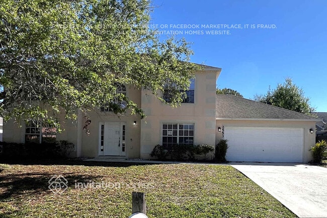 property at 2553 SW Grotto Cir