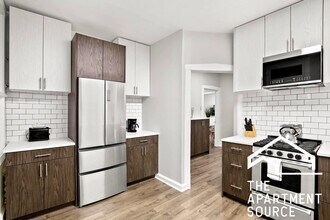 3908 W Roscoe St, Unit 2 in Chicago, IL - Foto de edificio - Building Photo