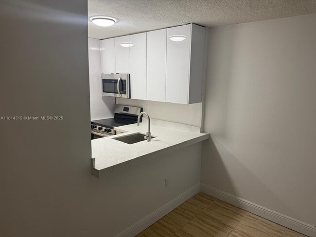 property at 496 NW 165th St