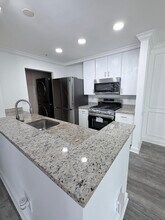 14197 Cuddy Loop, Unit 102 in Woodbridge, VA - Building Photo - Building Photo