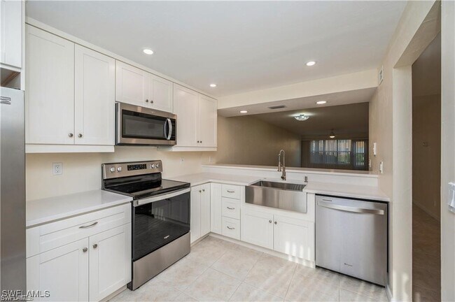 4130 Looking Glass Ln in Naples, FL - Building Photo - Building Photo