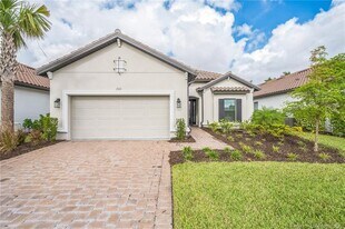 15111 Pescara St in Naples, FL - Building Photo