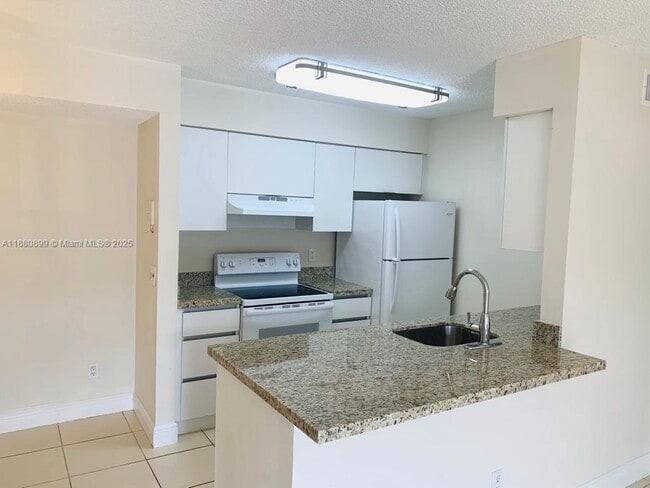 property at 10477 NW 7th St