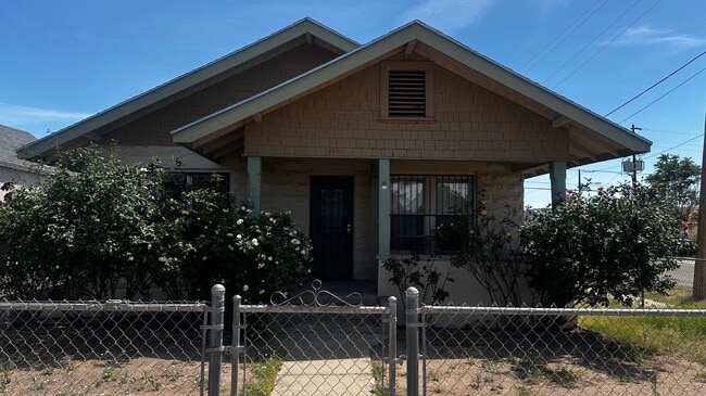 property at 703 E 13th St