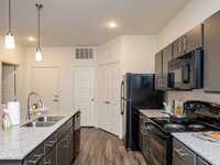 The Palms at Sunset Lakes Apartment Homes in Zachary, LA - Building Photo - Building Photo