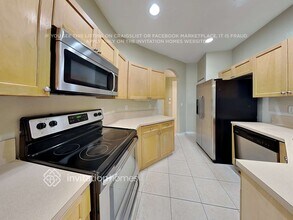 1159 Sweet Violet Ct, Unit 123 in West Palm Beach, FL - Foto de edificio - Building Photo