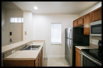 2250 San Vital Dr-Unit -102 in Kissimmee, FL - Building Photo - Building Photo