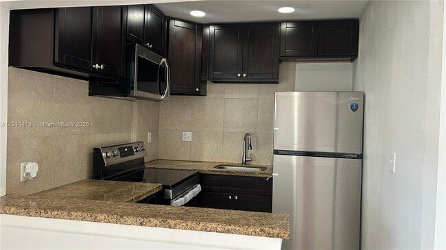 property at 2121 NE 168th St