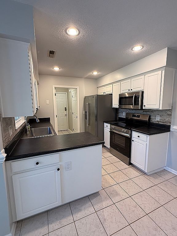 7303 Flintrock Ct in Wilmington, NC - Foto de edificio - Building Photo