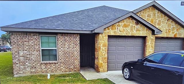 property at 407 W Criner St