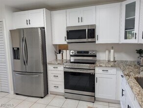 15493 Admiralty Cir in North Fort Myers, FL - Building Photo - Building Photo