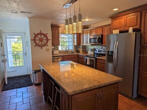 5600 Beach Way Dr in Sarasota, FL - Foto de edificio - Building Photo