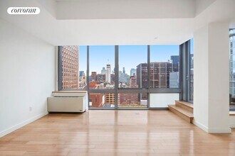 225 W 60th St in New York, NY - Building Photo - Building Photo