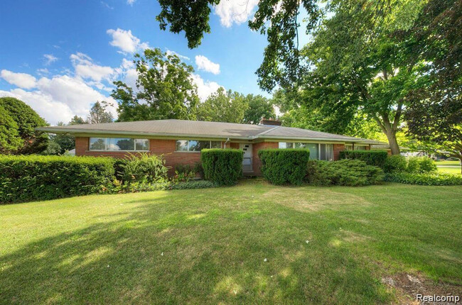 property at 48707 Eight Mile W