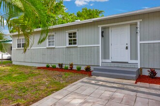 3931 Kewanee Rd in Atlantis, FL - Building Photo - Building Photo