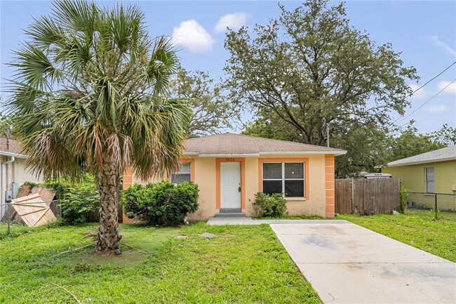 3803 N Garrison St in Tampa, FL - Foto de edificio - Building Photo