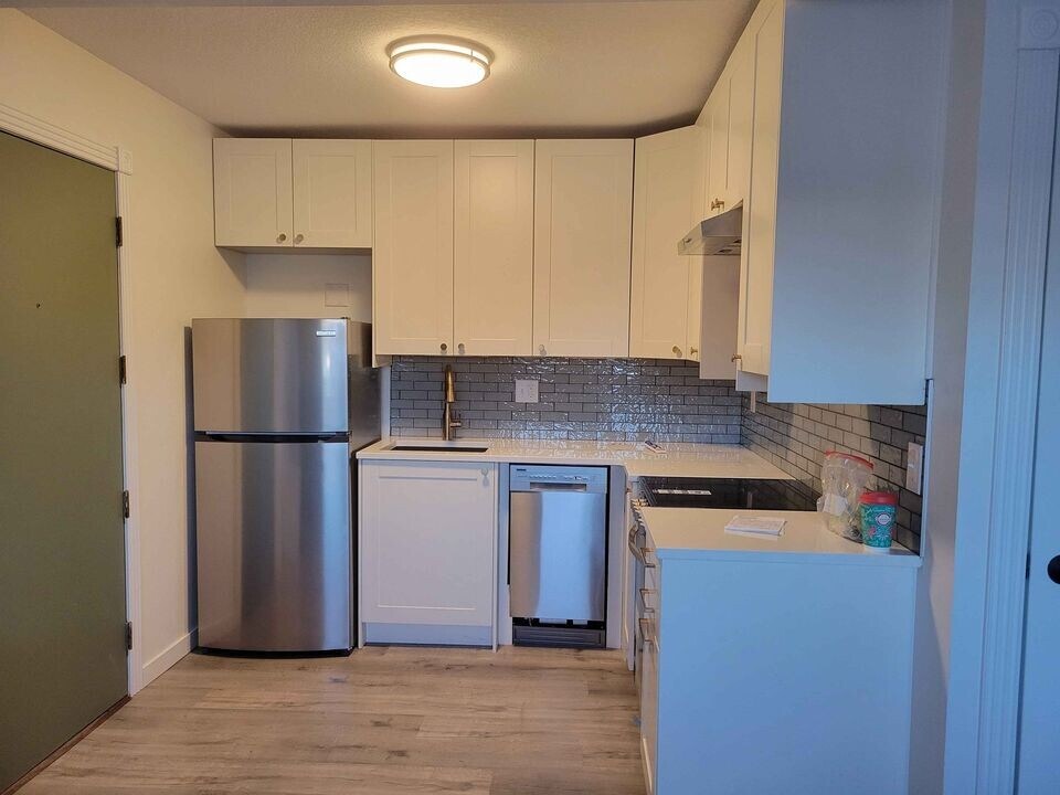 409 4th St NE, Unit 1 in Mitchellville, IA - Building Photo