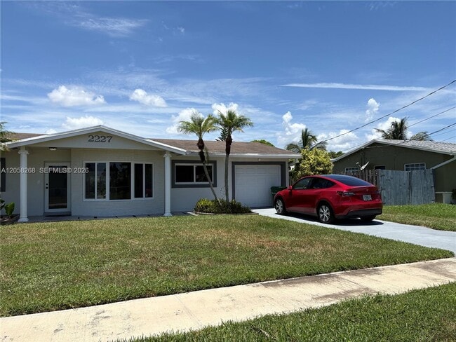 property at 2227 NW 65th Ave