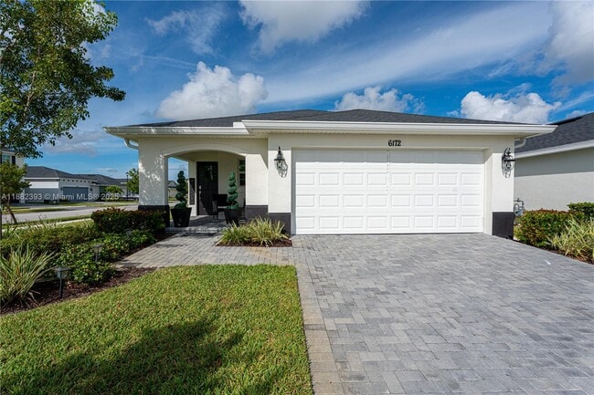 property at 6172 NW Sweetwood Dr