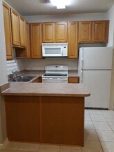 1111 Oscar Square-Unit -B in Kissimmee, FL - Building Photo - Building Photo