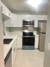 1585 NE Beacon Dr, Unit 1585 NE Beacon Drive 1103 in Jensen Beach, FL - Building Photo - Building Photo