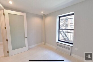 STANTON ST., Unit 4H in New York, NY - Foto de edificio - Building Photo