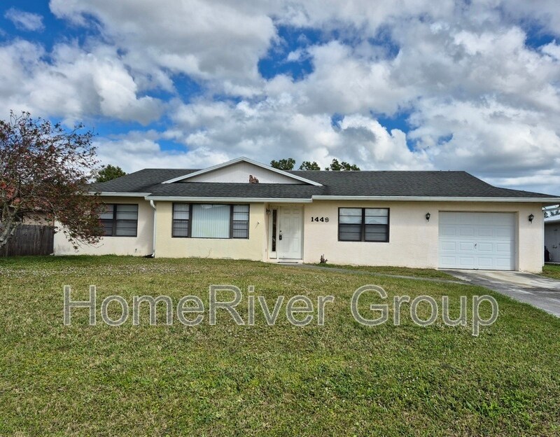 1449 SE Barker Ln in Port St. Lucie, FL - Building Photo