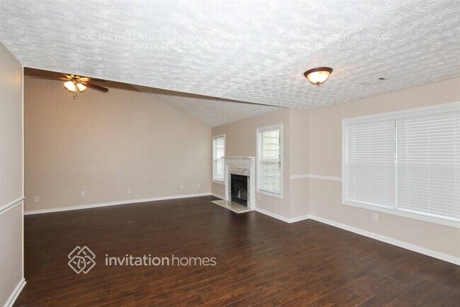 3990 Piper Glen Dr NE, Unit 128E in Buford, GA - Building Photo - Building Photo