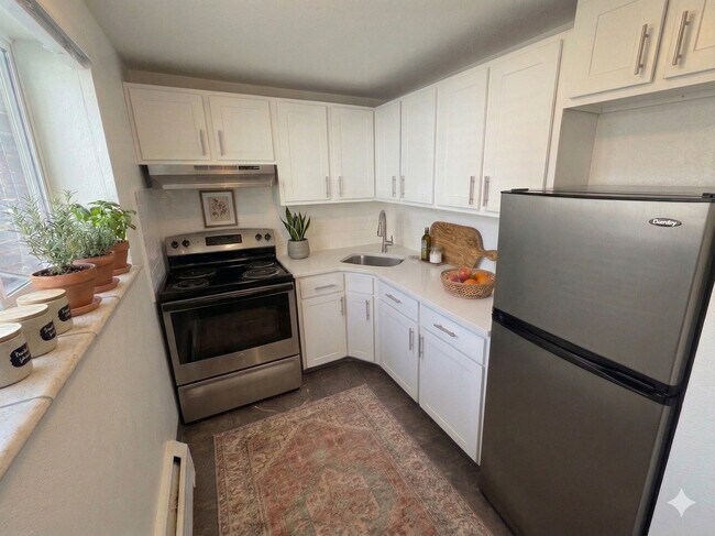 At the Parc in Denver, CO - Building Photo - Building Photo