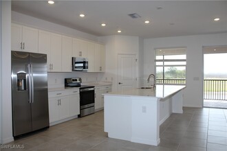 5686 Melbourne Ct in Ave Maria, FL - Foto de edificio - Building Photo