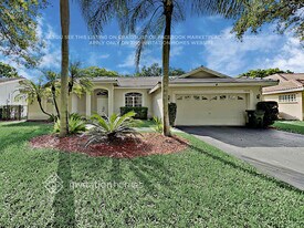 5831 NW 40th Ln in Coconut Creek, FL - Building Photo