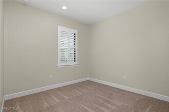13611 Villa Di Preserve Ln in Estero, FL - Foto de edificio - Building Photo